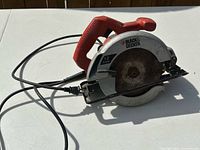 Full view of Black & Decker circular saw with cord