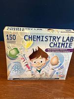 Front of Chemistry Lab box showing brand, experiment count, age rating