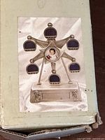 Box top showing image of ferris wheel photo frame