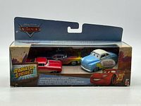 Front view of sealed 3-pack showing all three cars and Radiator Springs branding