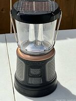 Front view of Duracell lantern showing controls and body