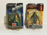 Both carded action figures side by side showing overall condition