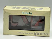 Window box showing Kubota KX121-3 branding