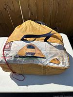 Carry bag with Outbound branding and tent specifications visible