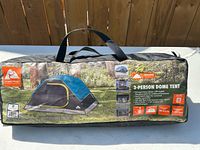Full view of packed Ozark Trail tent in graphic carry bag