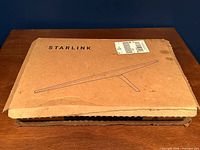 Closed Starlink-branded shipping box