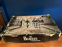 Outer Beatles Rock Band box showing heavy wear