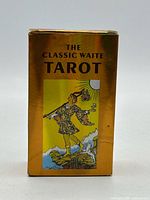 Front of gold box showing The Classic Waite Tarot title and The Fool card artwork
