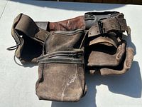 Front view of suede leather tool belt showing pouches and belt