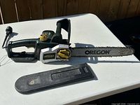 Full view of Yardworks chainsaw with bar cover removed