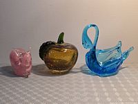 group shot of blue swan, amber apple, pink bunny
