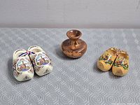 Overview of both clog pairs and bud vase