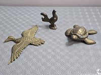 overview of duck, rooster, turtle on surface
