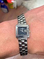 Watch worn on wrist showing overall appearance and bracelet