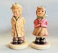 Front view of both Goebel Hummel figurines