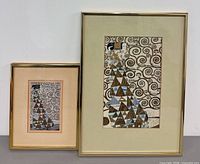 Both framed prints side by side showing relative sizes