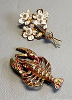 Front view of both brooches showing design and finish