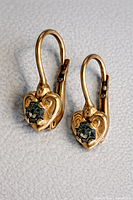 Front view of both gold heart leverback earrings showing stones and design details