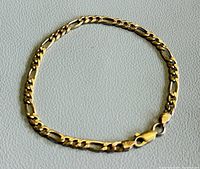 Full view of Figaro bracelet laid flat