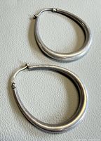 Front view of both sterling silver hoop earrings