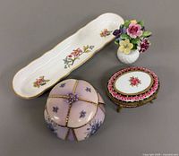 Group shot showing tray, two trinket boxes, porcelain bouquet