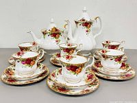 Full 20-piece Royal Albert Old Country Roses tea service displayed