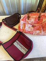All three bags together on table
