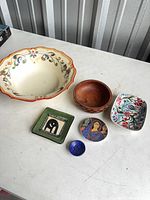 All six bowls and dishes arranged on table