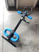 Full view of Merach ab-core machine showing frame, foam pads and support bars