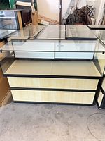 Front and top view of glass top retail display case