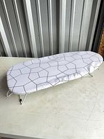Top view of ironing board with cover in place