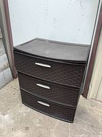 Front view of Sterilite brown three-drawer plastic storage unit