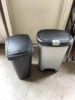 Both trash cans side by side showing size and shape