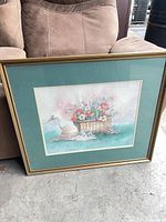 Front view of framed floral goose print