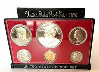Front view of proof set showing all six coins in red insert