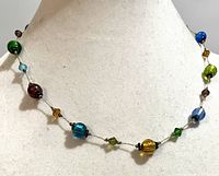Necklace on display bust showing bead variety and spacing