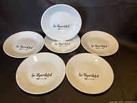 All six plates displayed to show design and condition