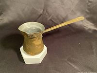 Full view of copper Turkish coffee pot showing body shape and patina