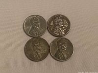 Four 1943 steel wheat pennies obverse side
