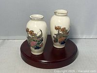Both vases front view on stand