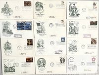 Overview of all 12 First Day Cover envelopes showing stamps, cachets and cancellations