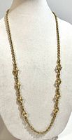 necklace draped to show chain style and stations