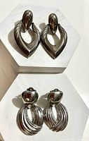 Front view of both earring pairs