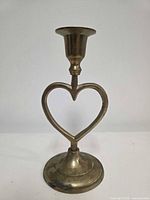 Full view of brass heart candlestick