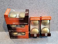 Front view of five boxed ILCO door knob sets