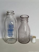 Two bottles and small scale reference object