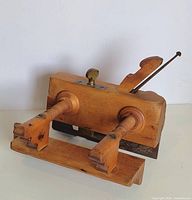 oblique front view showing complete plane with arms, fence, depth stop and iron
