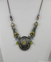 Full view of necklace showing pendant and chain