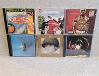 Front view of six CDs arranged in two rows
