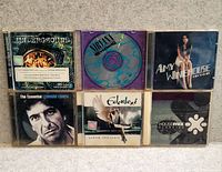 Six CD jewel cases front view